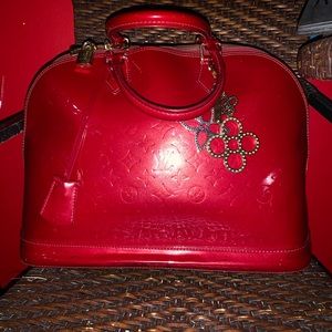 Louis Vuitton Alma will include Charm in Purchase